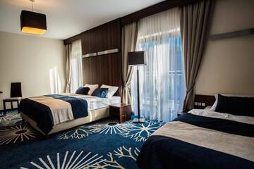 Фото номера Трехместный номер Делюкс Курортные отели Kasor Resort &amp; Spa г. Стрыкув 4