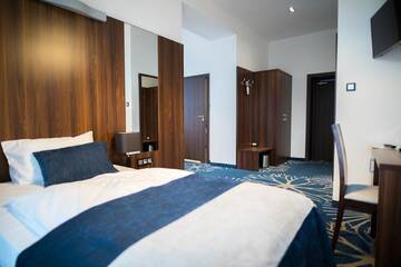 Фото номера Трехместный номер «Комфорт» Курортные отели Kasor Resort &amp; Spa г. Стрыкув 5