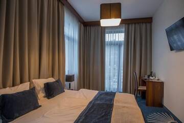 Фото номера Апартаменты с 2 спальнями Курортные отели Kasor Resort &amp; Spa г. Стрыкув 3